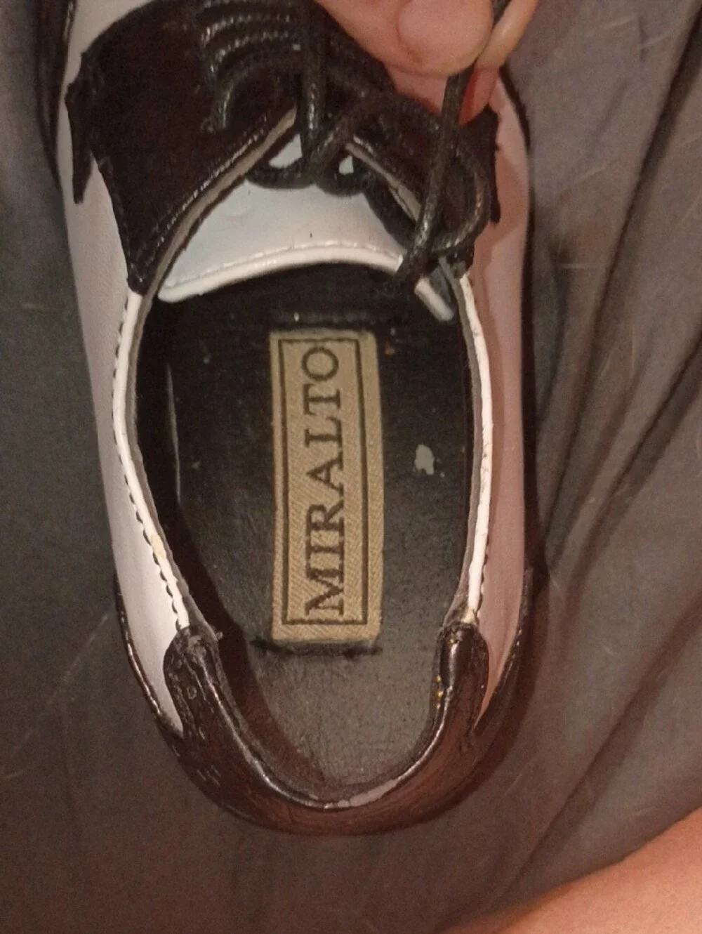 Classic Black and White Men’s Wingtip Oxfords